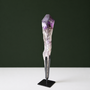 Naturally terminated amethyst wand with growth markings on black metal stand