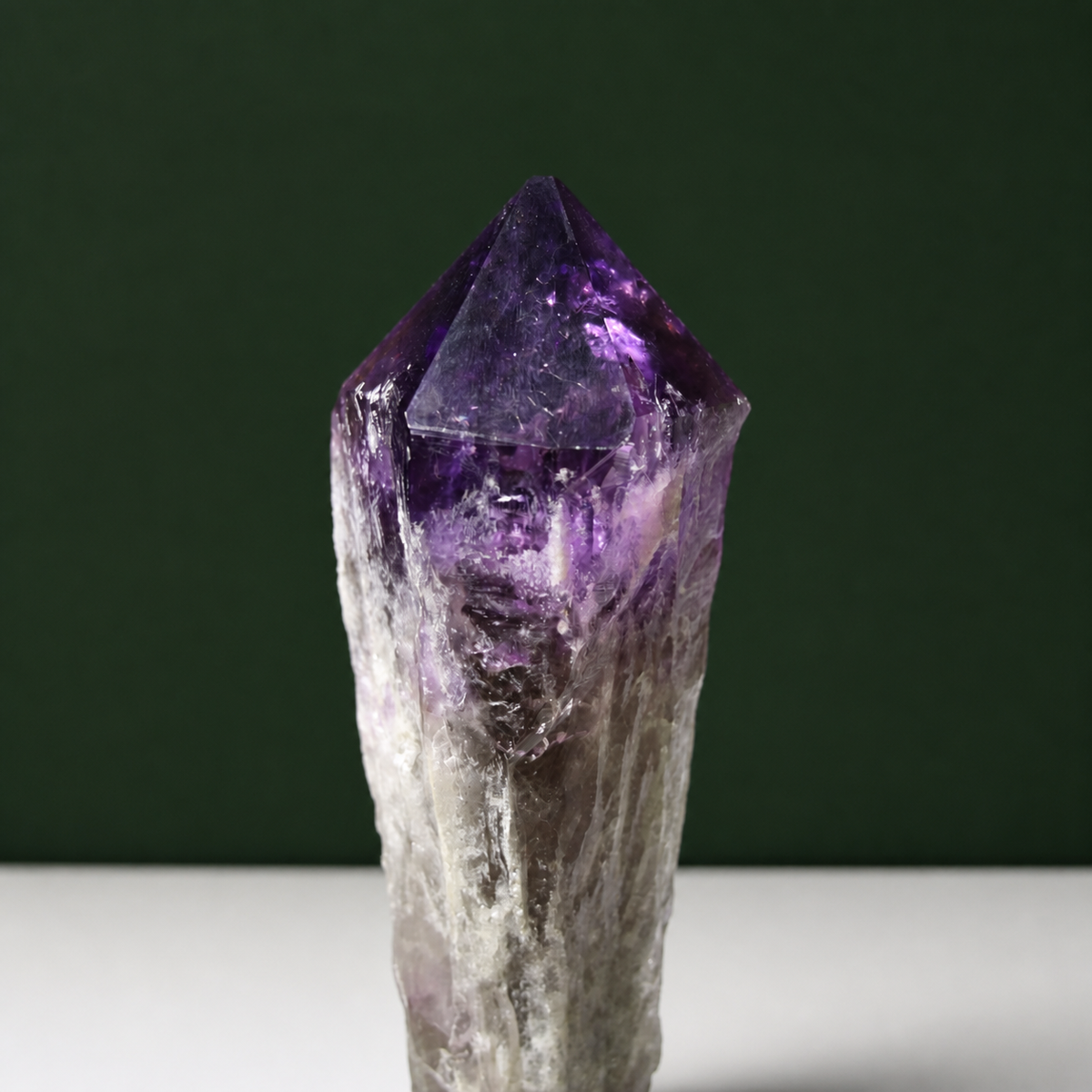 Deep violet amethyst wand, natural termination detail