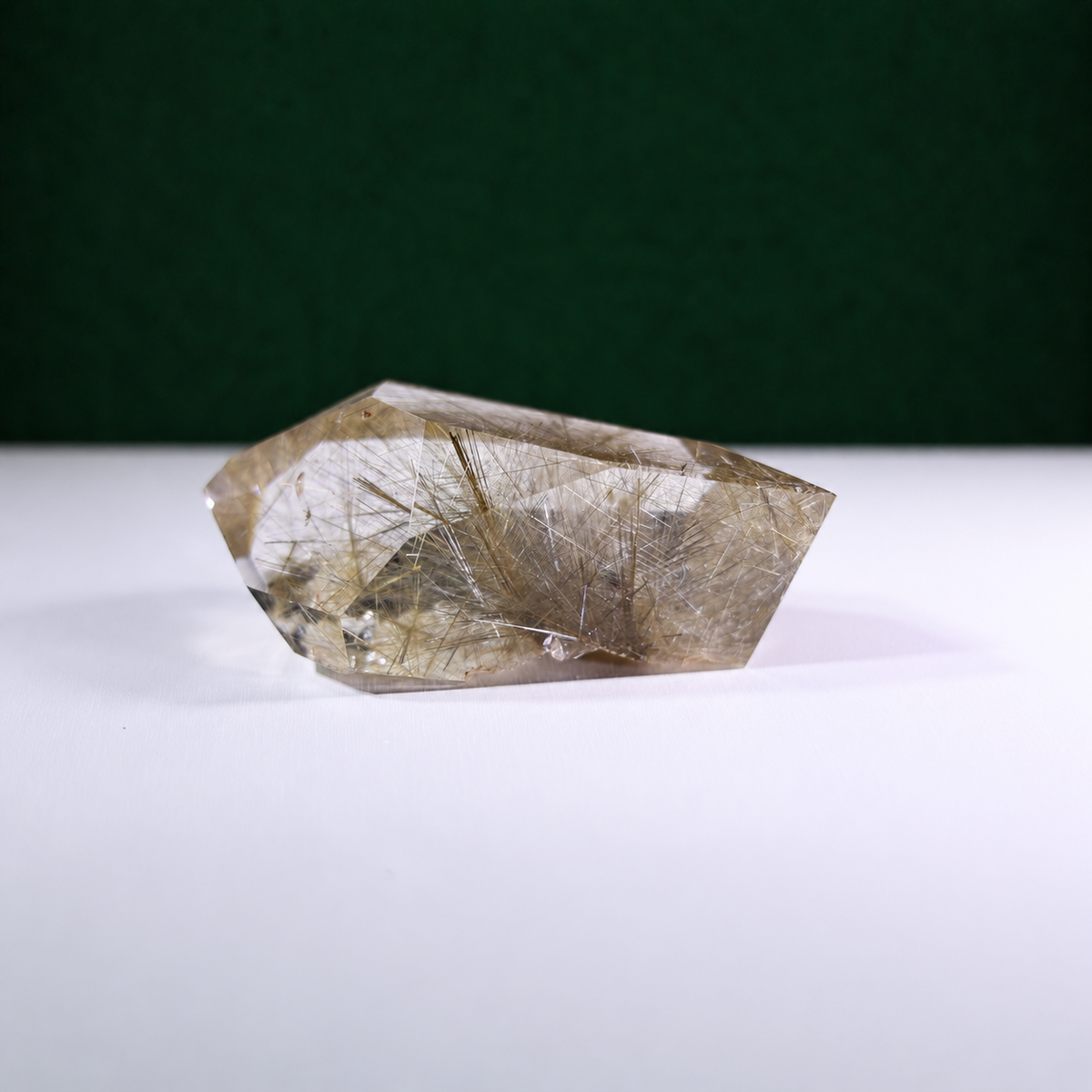Polished rutilated quartz freeform, 185 g, alternate view 1 showing natural rutile inclusions.