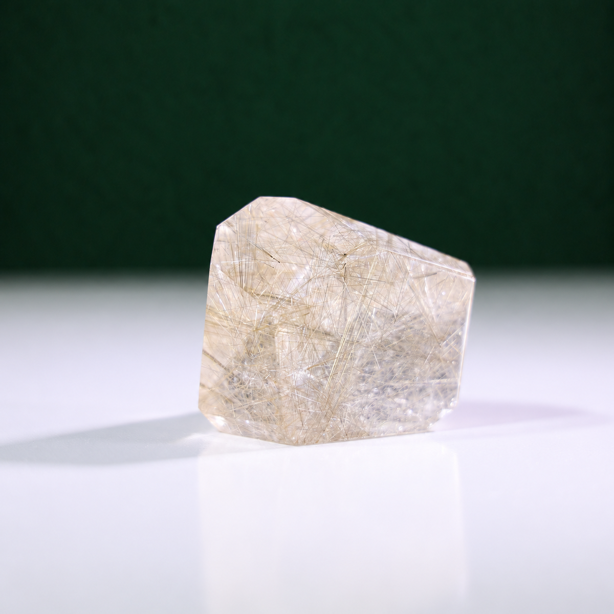 Polished rutilated quartz freeform, 223 g, alternate view 1 showing natural rutile inclusions.