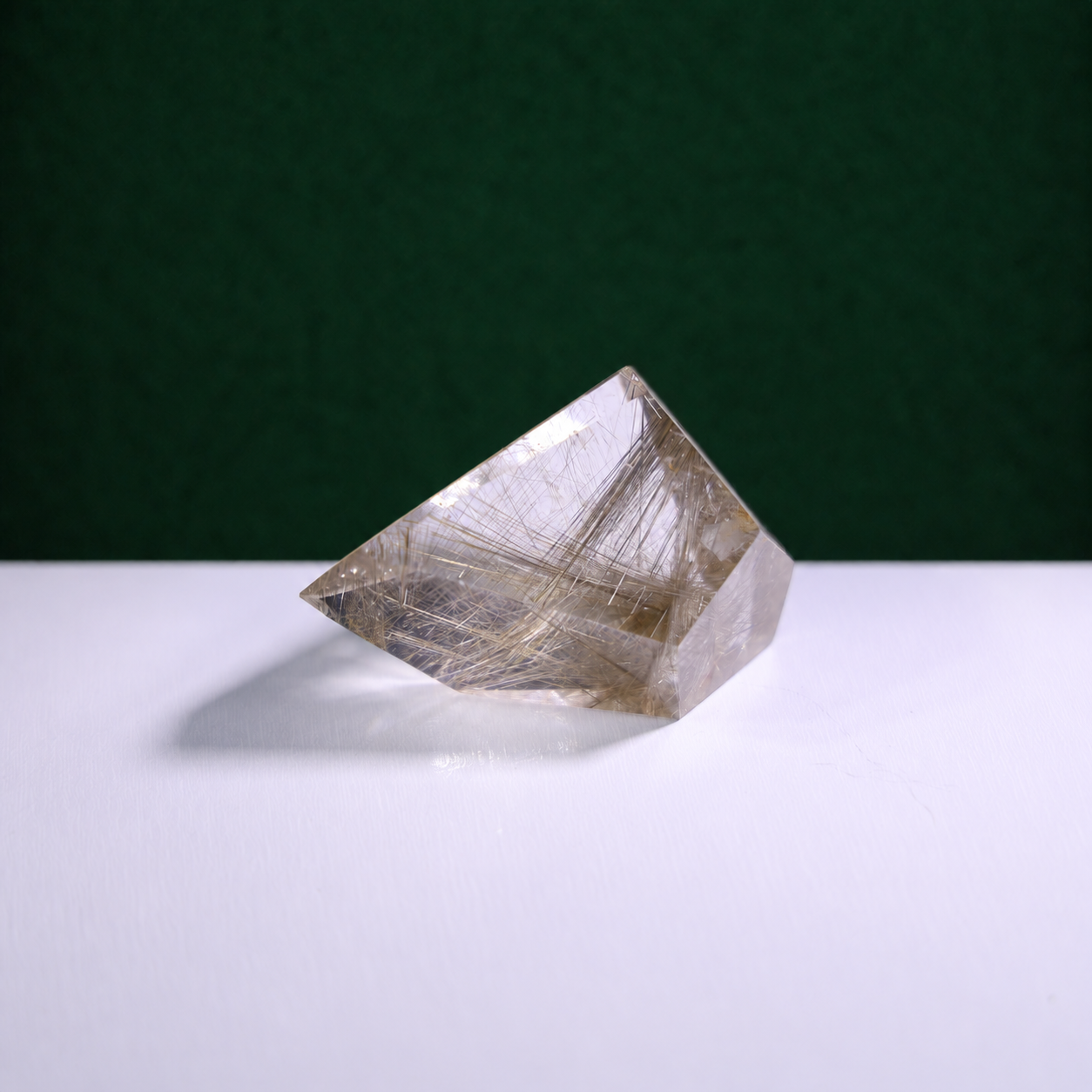 Polished rutilated quartz freeform, 62 g, alternate view 1 showing natural rutile inclusions.