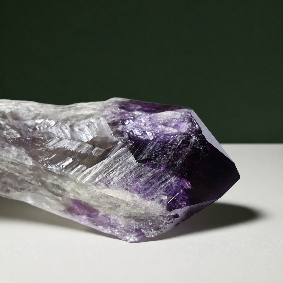 Deep purple naturally terminated amethyst wand, side view