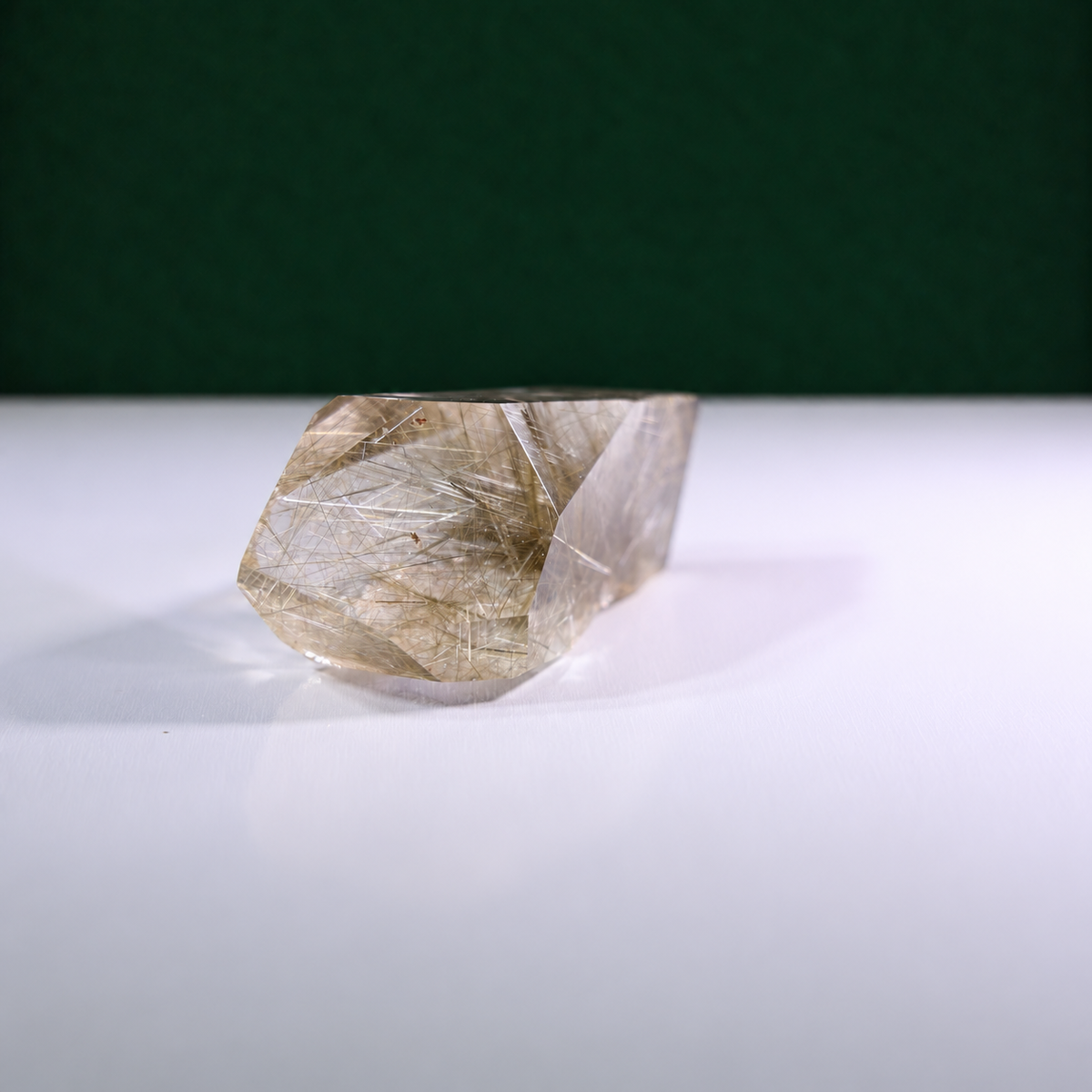 Polished rutilated quartz freeform, 185 g, alternate view 2 showing natural rutile inclusions.