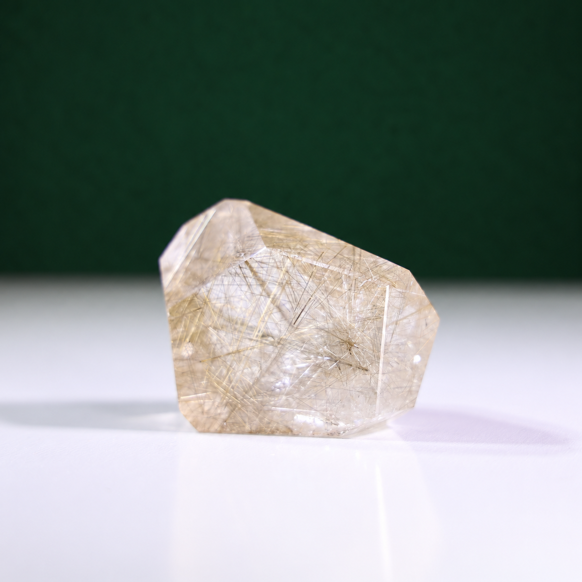 Polished rutilated quartz freeform, 223 g, alternate view 2 showing natural rutile inclusions.