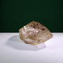 Polished rutilated quartz freeform, 417 g, side view showing natural rutile inclusions.
