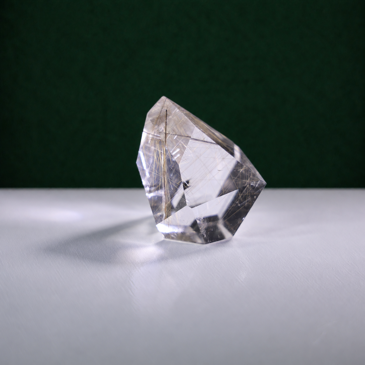 Polished rutilated quartz freeform, 72 g, alternate view 2 showing natural rutile inclusions.