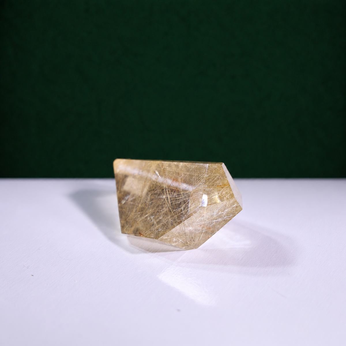 Polished rutilated quartz freeform, 79 g, alternate view 2 showing natural rutile inclusions.
