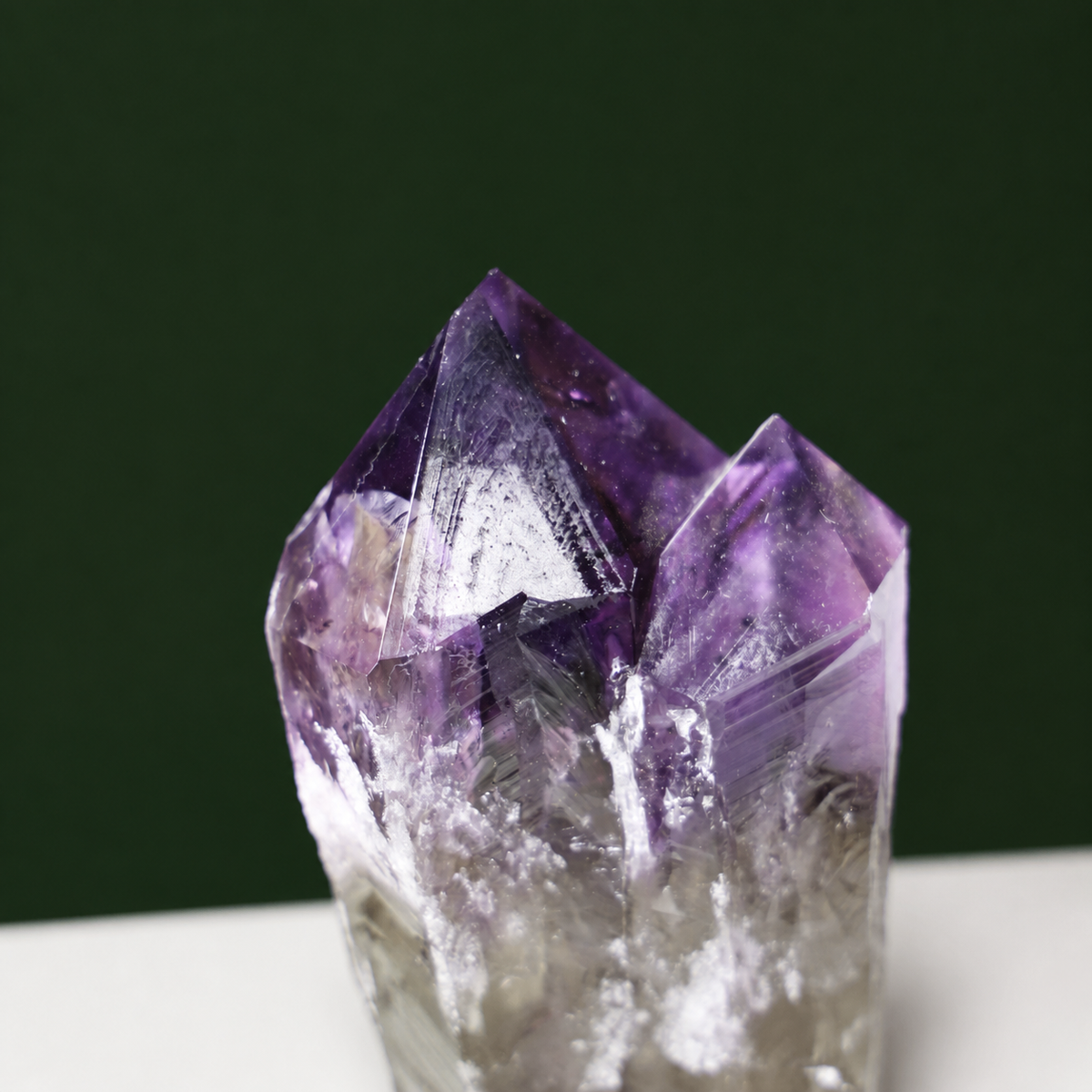 Natural terminations detail on multi-point amethyst wand