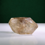 Polished rutilated quartz freeform, 417 g, reverse angled view showing natural rutile inclusions.