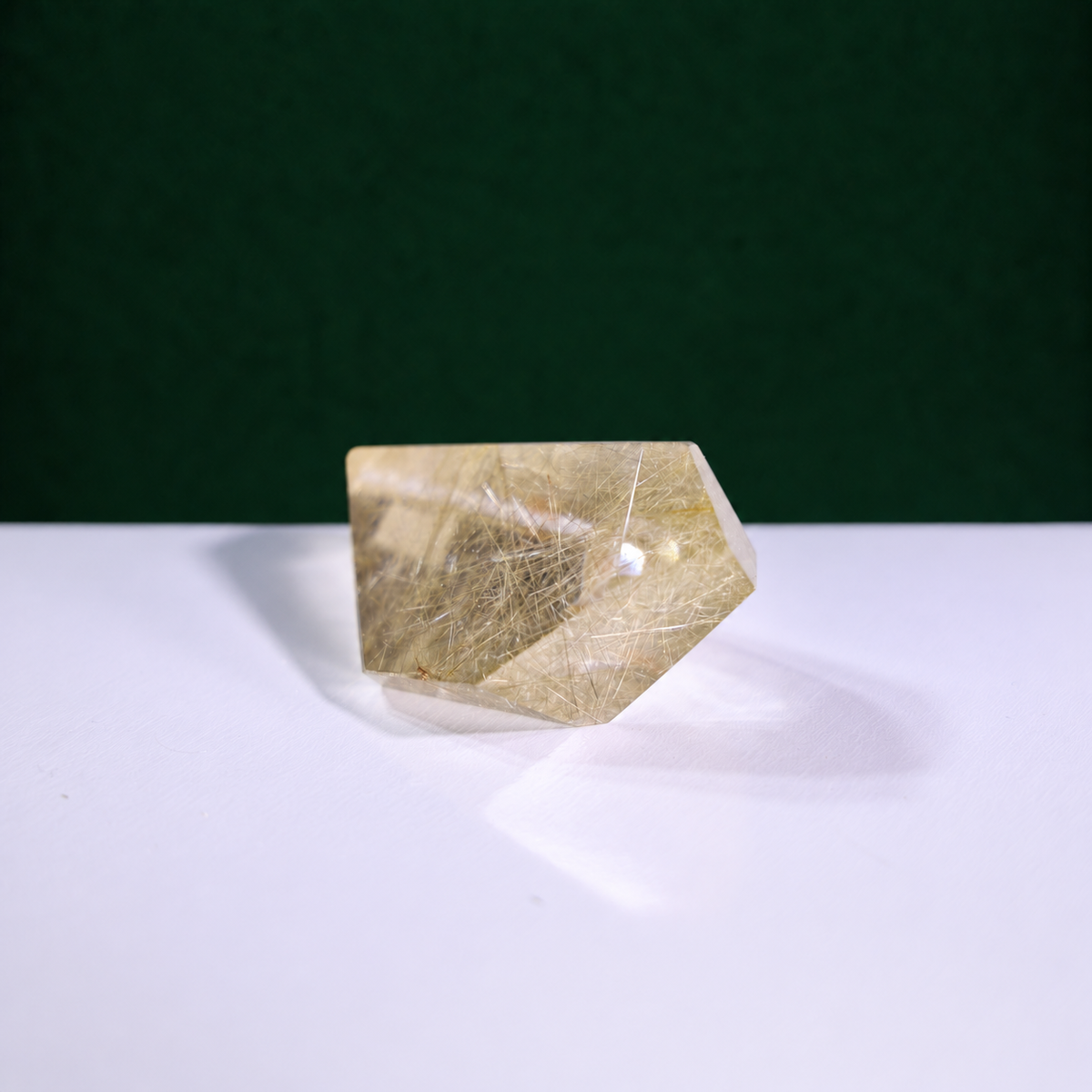 Polished rutilated quartz freeform, 79 g, alternate view 3 showing natural rutile inclusions.