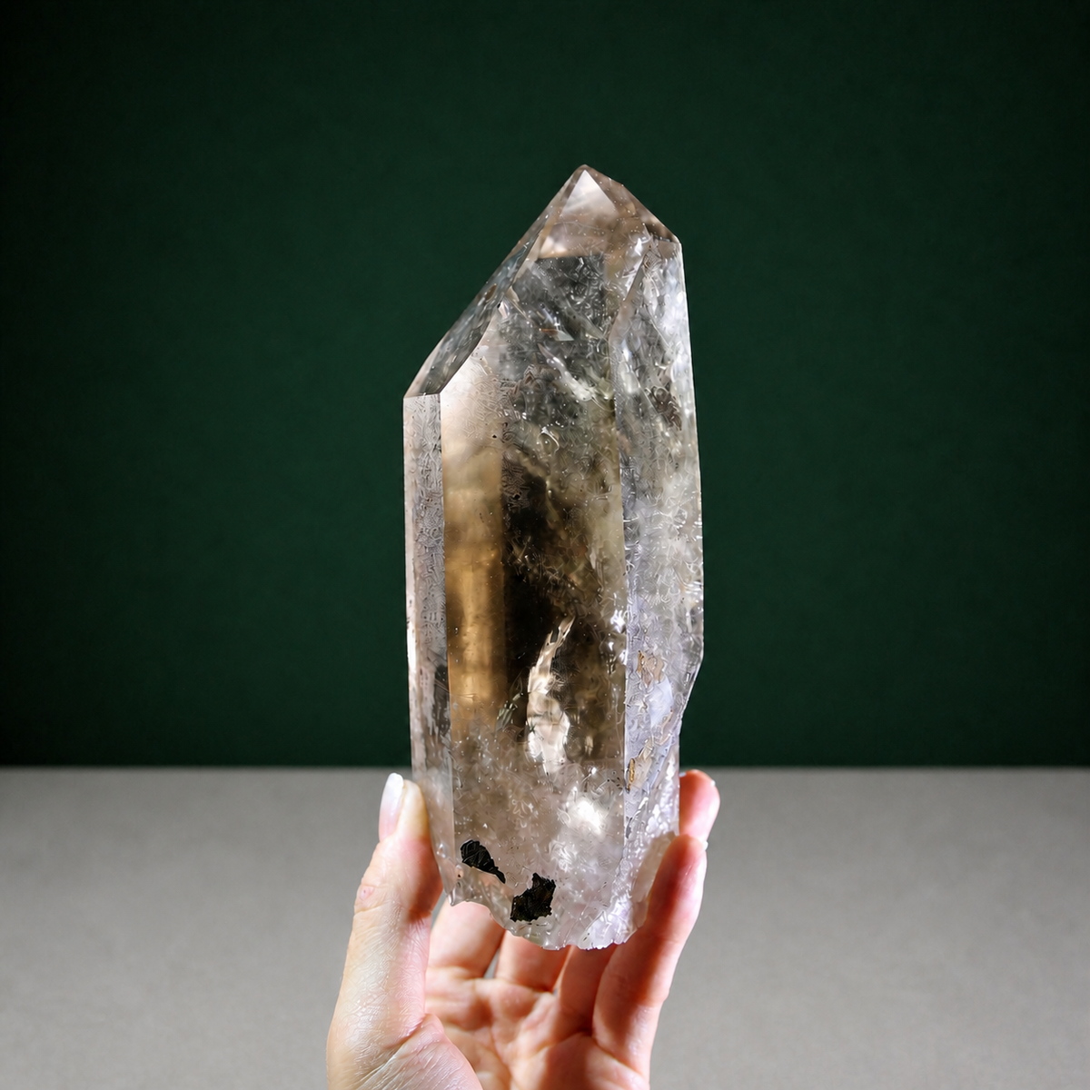 Unpolished Smoky Lemurian Seed with Iron Inclusions