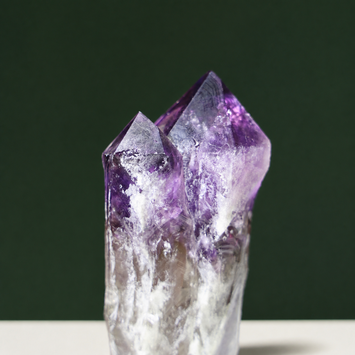 Growth markings detail on multi-point natural amethyst wand