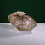 Polished rutilated quartz freeform, 417 g, back view showing natural rutile inclusions.