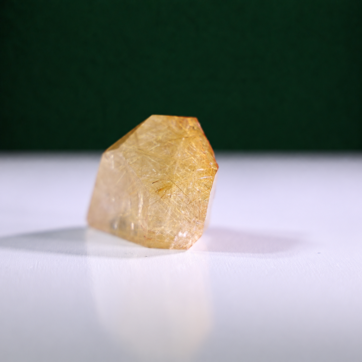 Polished rutilated quartz freeform, 75 g, alternate view 4 showing natural rutile inclusions.