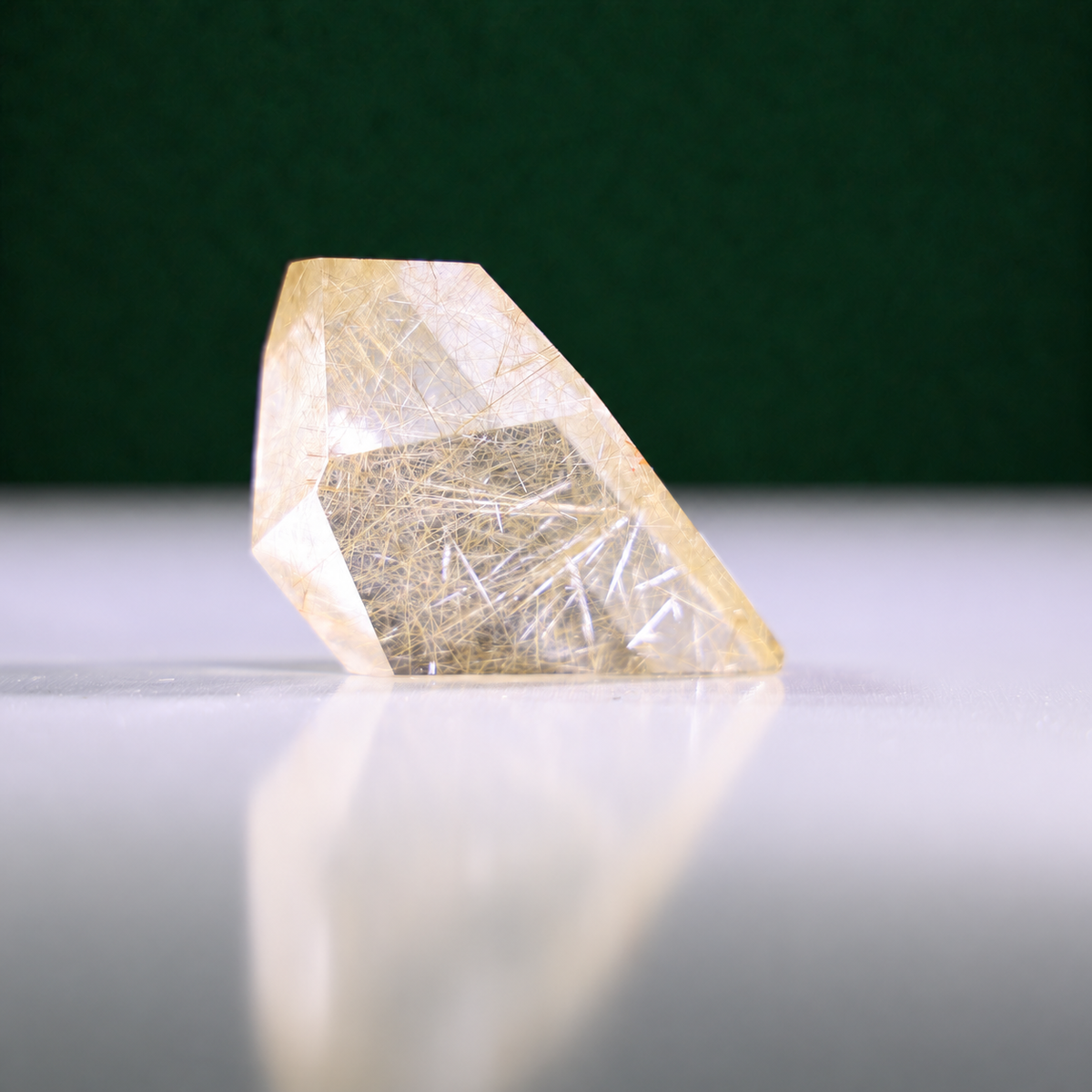 Polished rutilated quartz freeform, 79 g, alternate view 4 showing natural rutile inclusions.