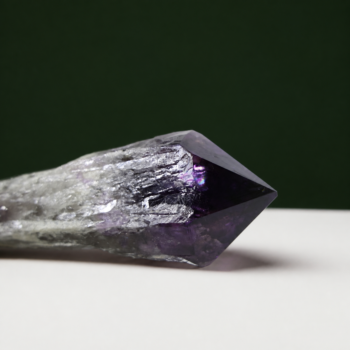 Deep violet amethyst wand, horizontal crystal detail