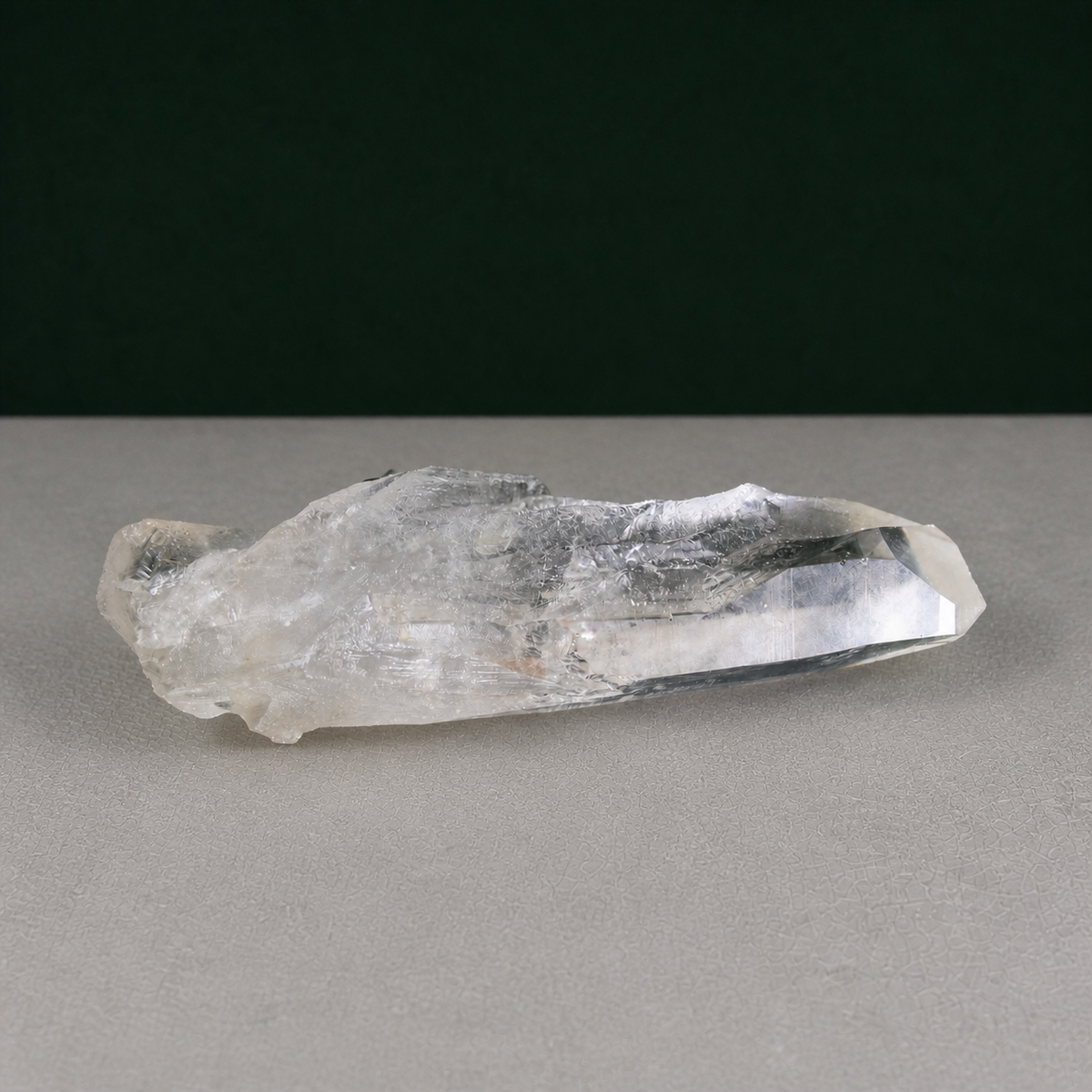 Unpolished Lemurian Seed with Striated Matrix Contact