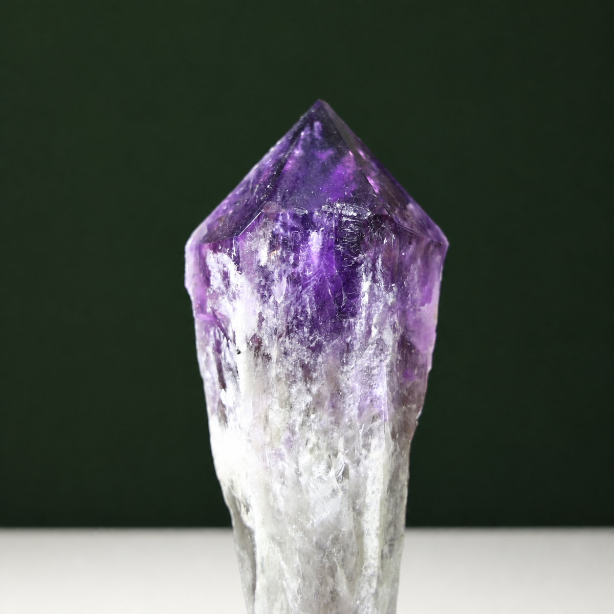 Deep violet amethyst wand, close view of growth markings