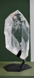 Front view of the collector-grade Lemurian phantom quartz on its display base