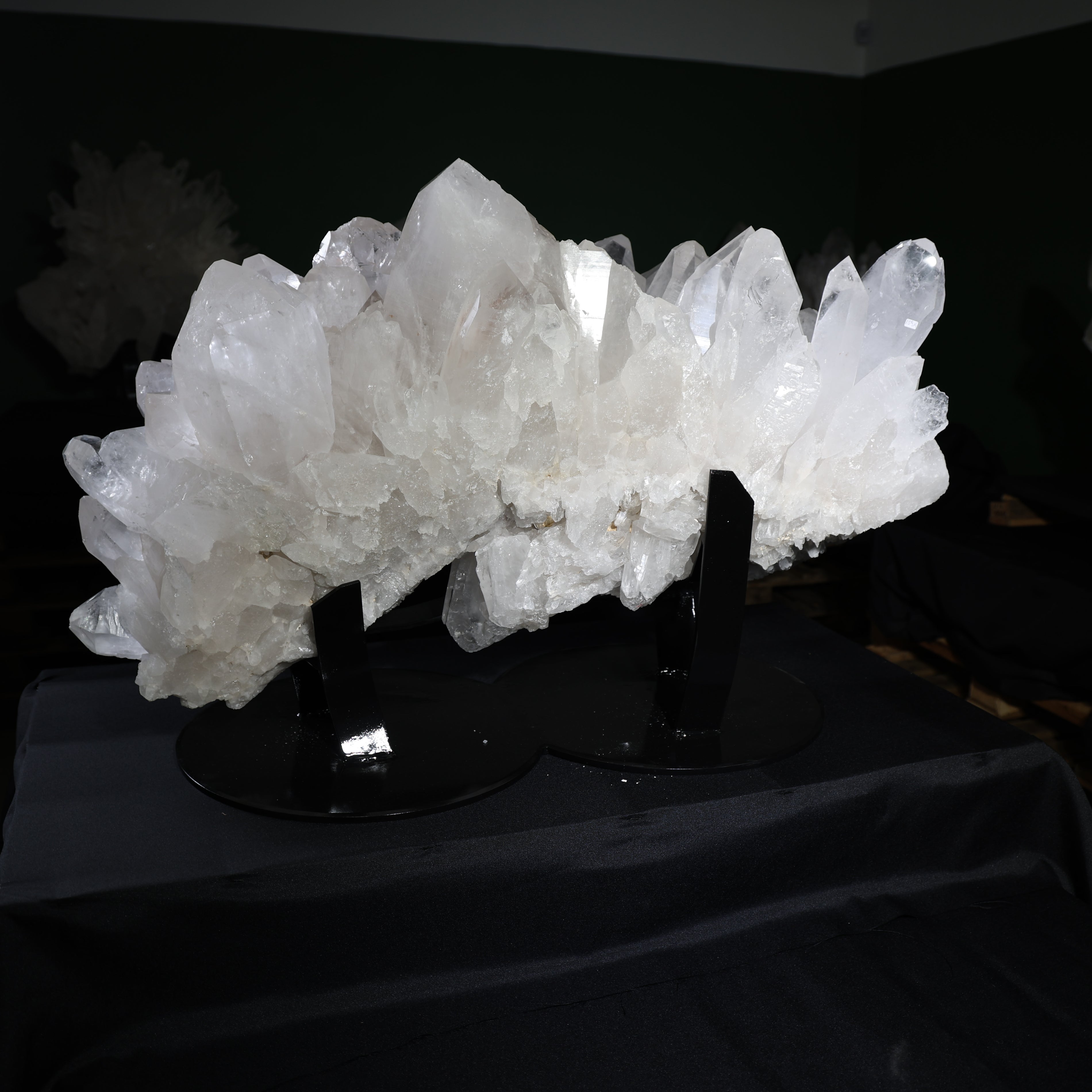 Front view of the crystallized-matrix Lemurian quartz point on its display base
