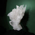 Side profile showing the unusual natural curve of the Lemurian quartz cluster