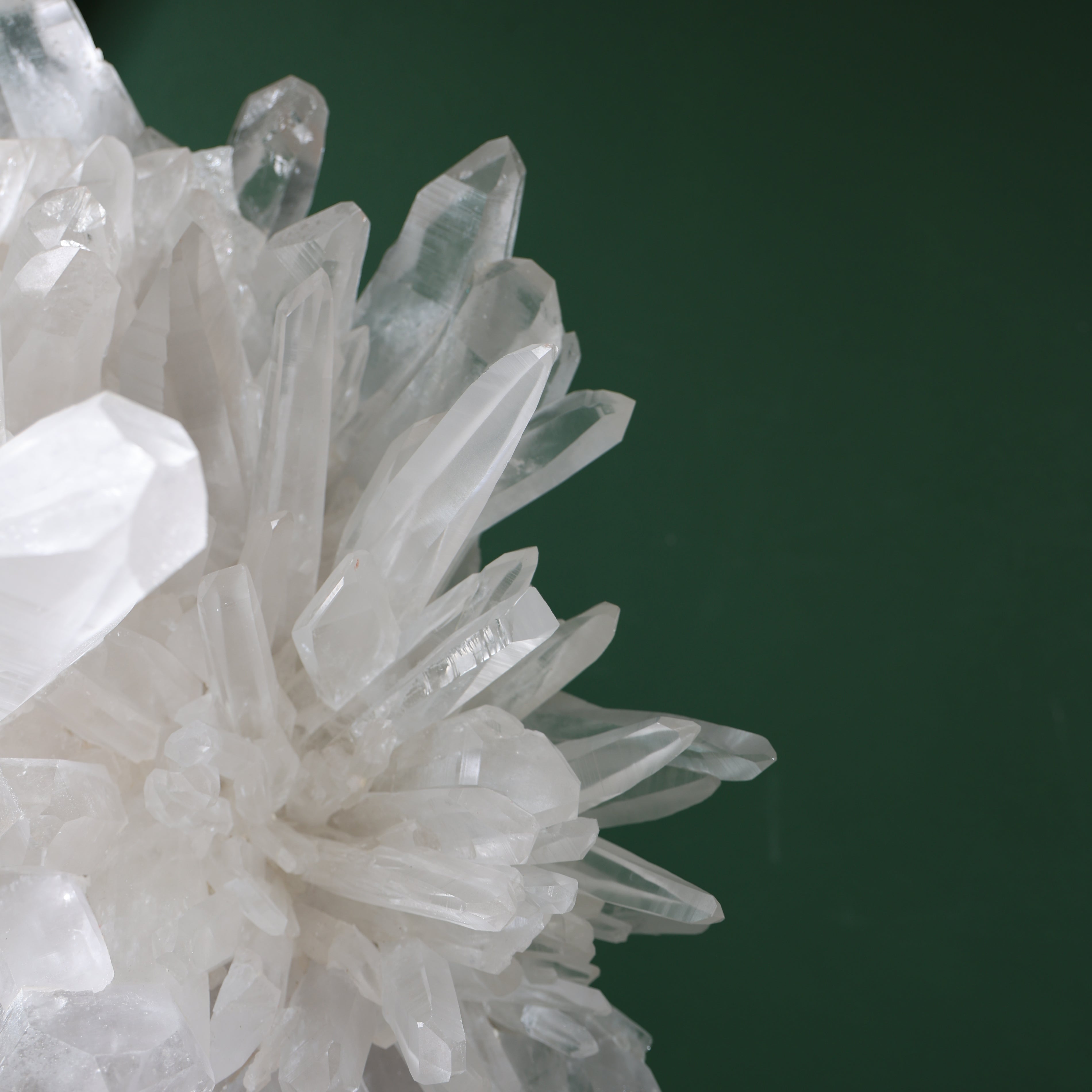 Close view of clear and milky Lemurian quartz points