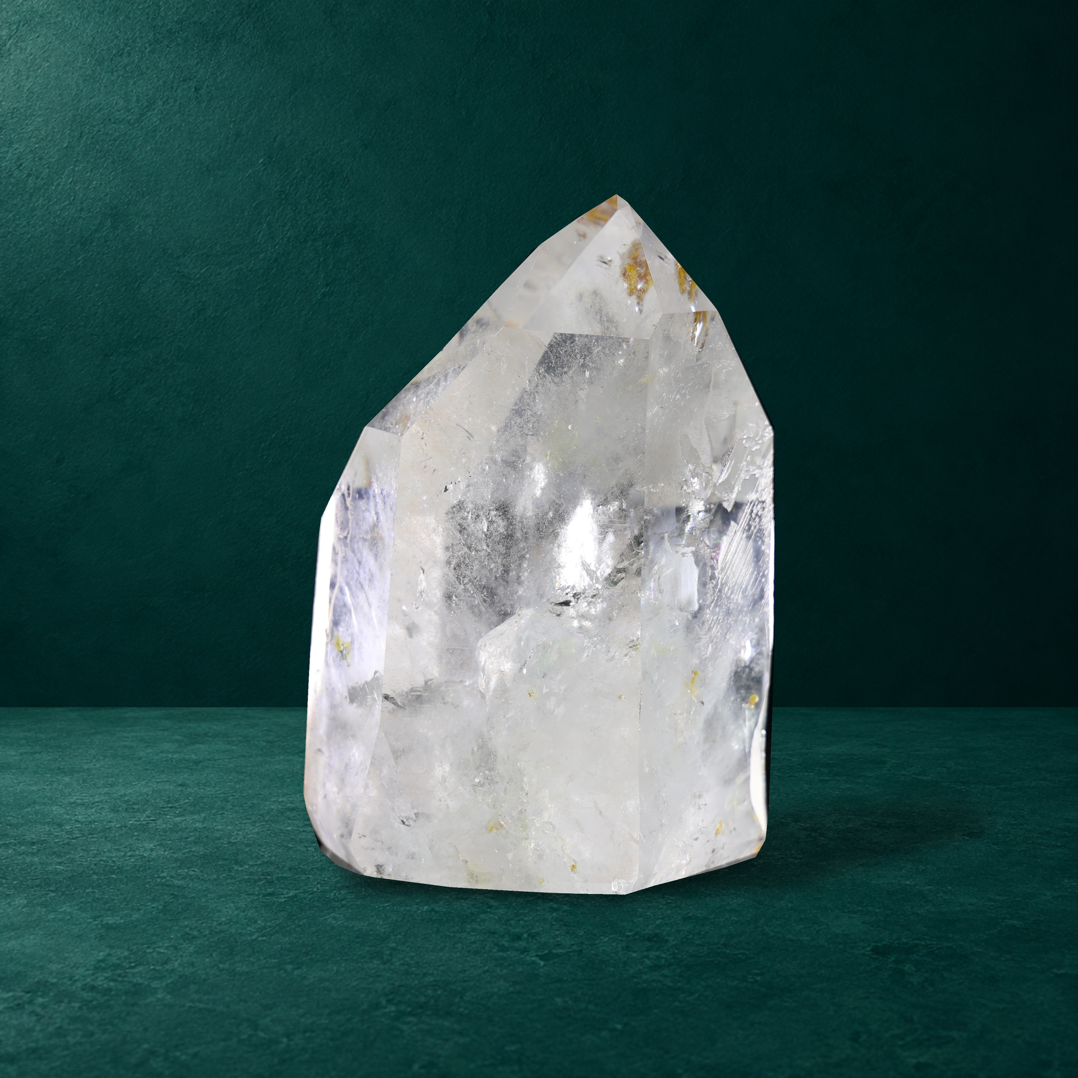 Polished quartz point with iron inclusions, 4.670 kg, front view.