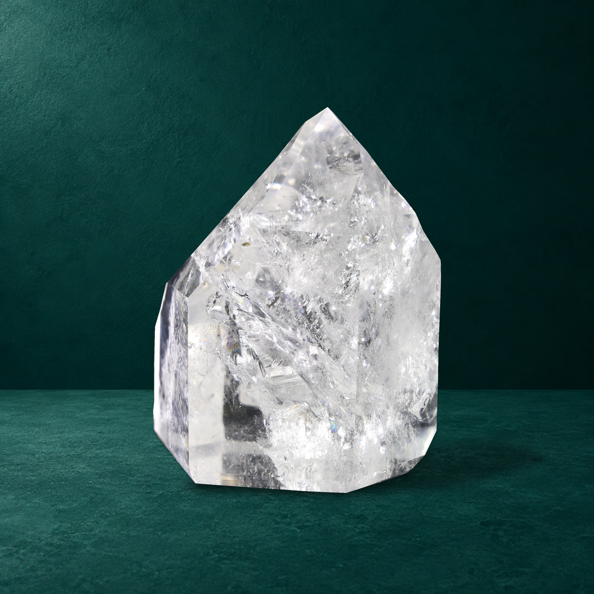 Polished quartz point, 1.059 kg, front view.