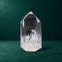 Polished quartz point, 0.790 kg, front view