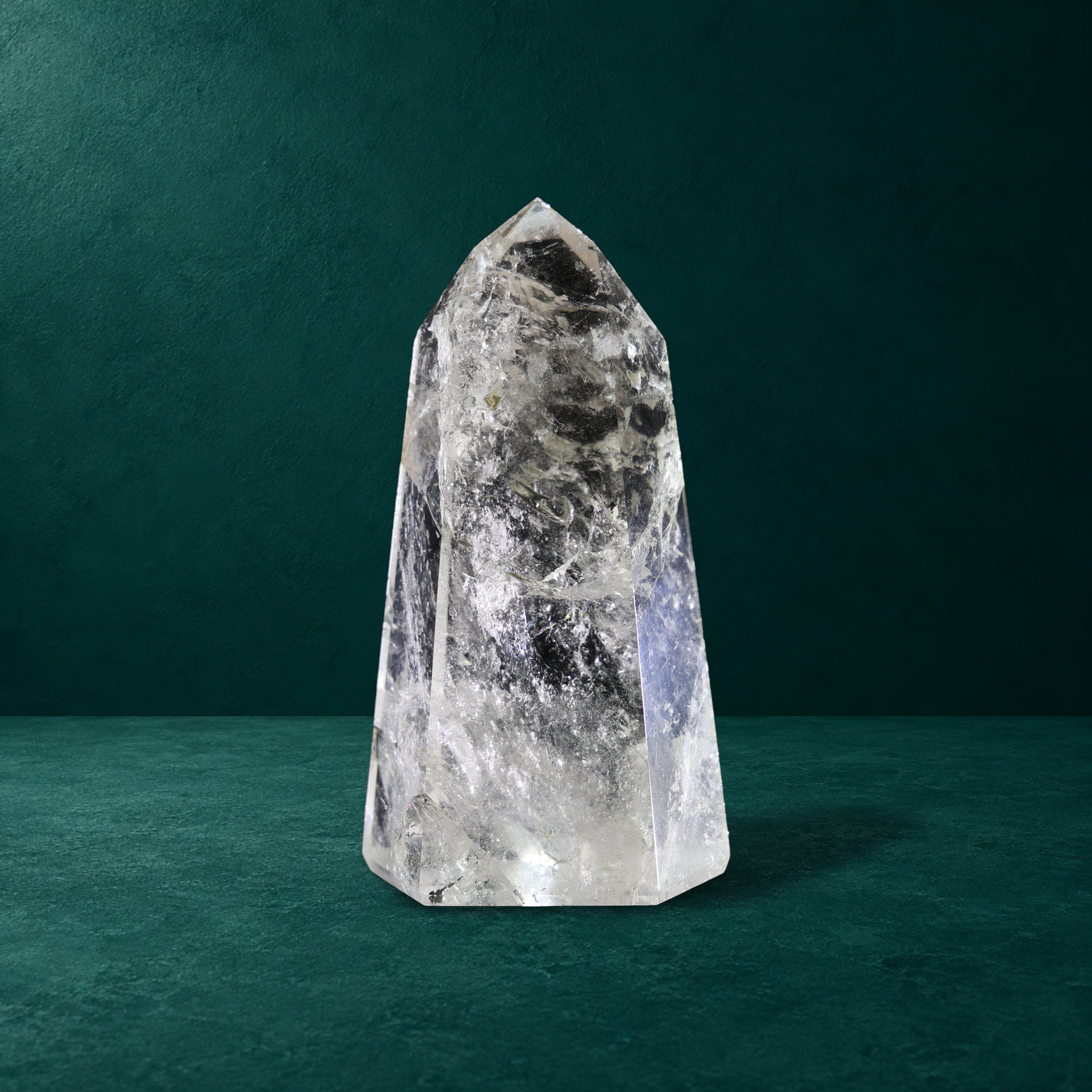 Polished quartz point, 1.556 kg, front view.