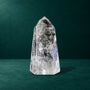 Polished quartz point, 1.556 kg, front view.