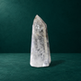 Side view of the 1.556 kg polished quartz point.