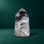 Polished quartz point, 1.049 kg, front view