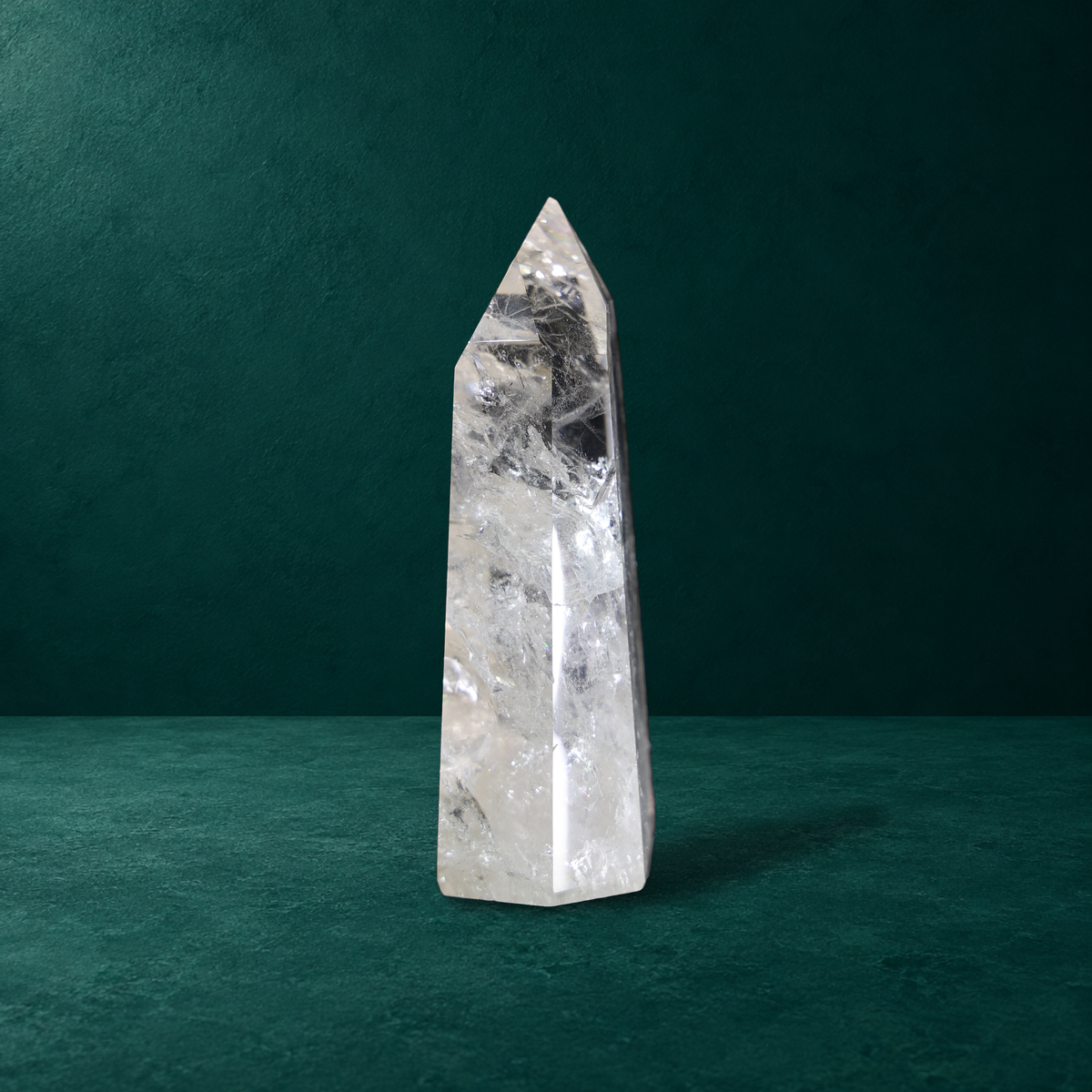 Polished quartz point, 1.049 kg, opposite side view