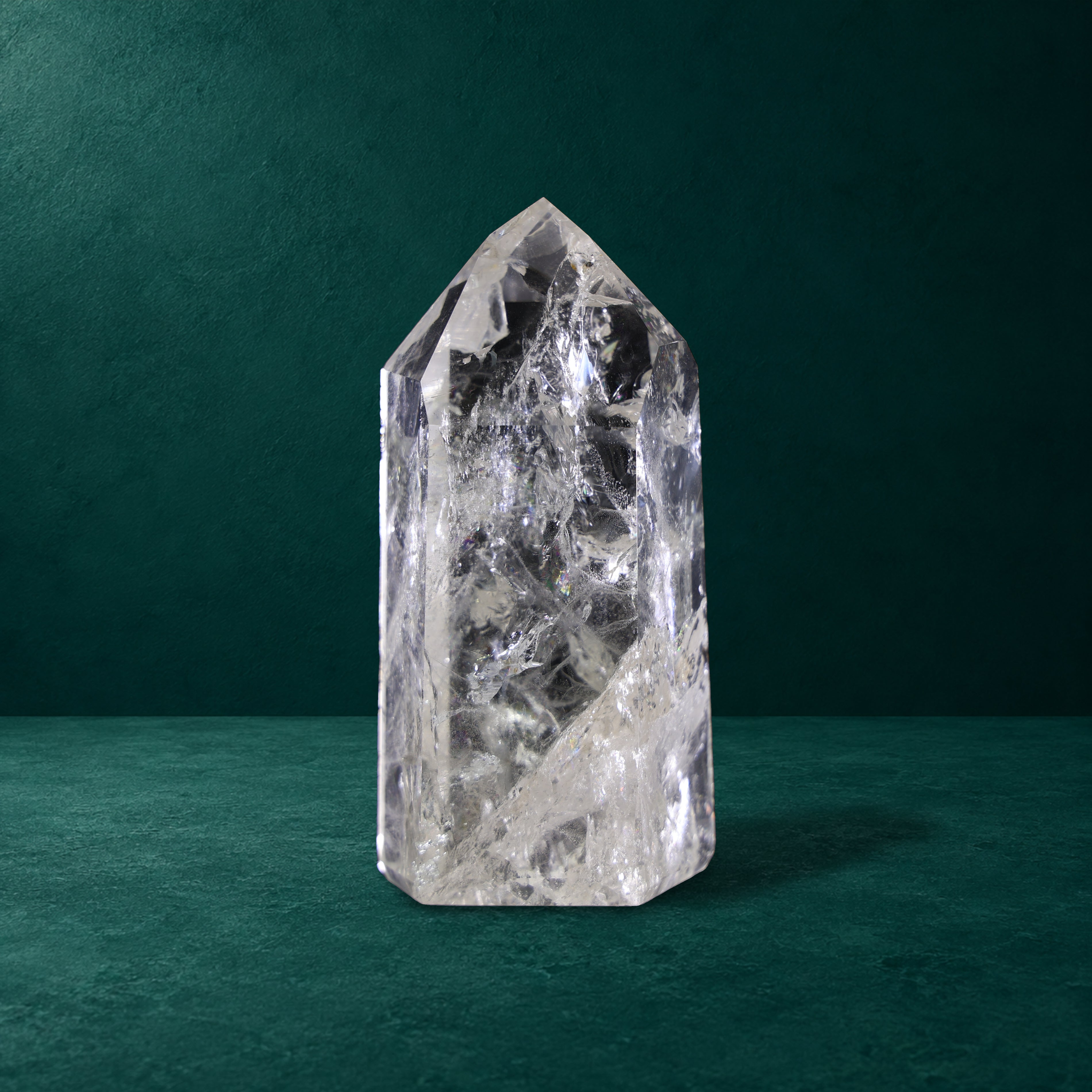 Polished quartz point, 1.101 kg, front view.