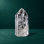 Polished quartz point, 1.101 kg, front view.