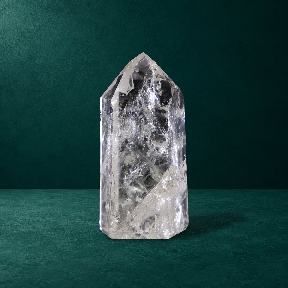 Polished quartz point, 1.101 kg, front view.
