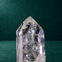 Close view of the quartz point tip and internal inclusions.