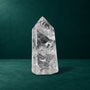 Polished quartz point, 0.897 kg, front view.