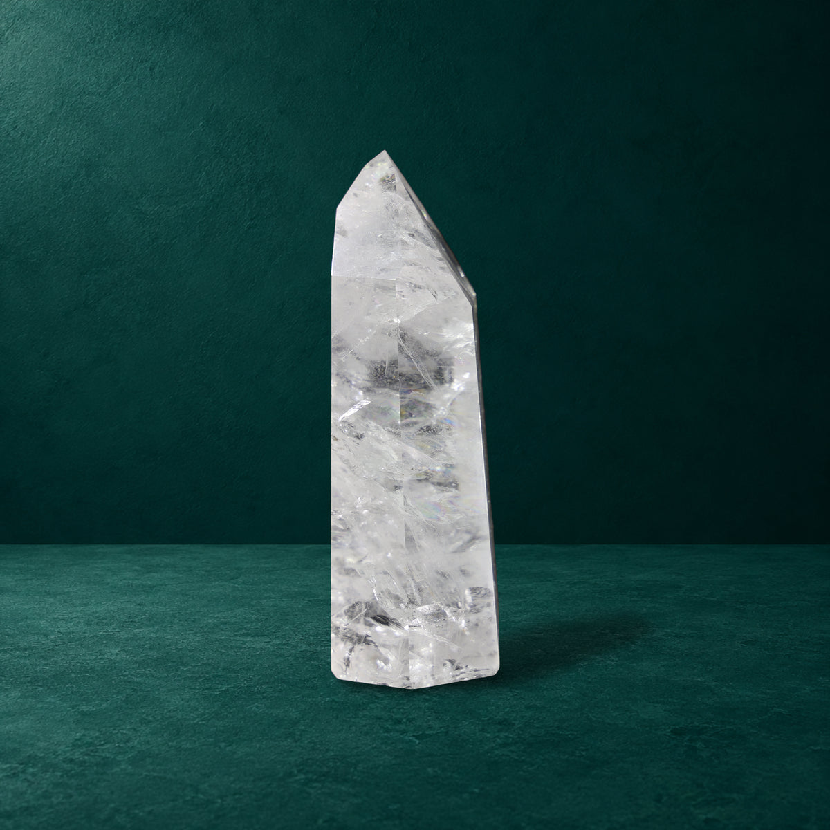 Narrow side view of the 0.897 kg polished quartz point.