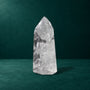 Angled side view of the 0.897 kg polished quartz point.