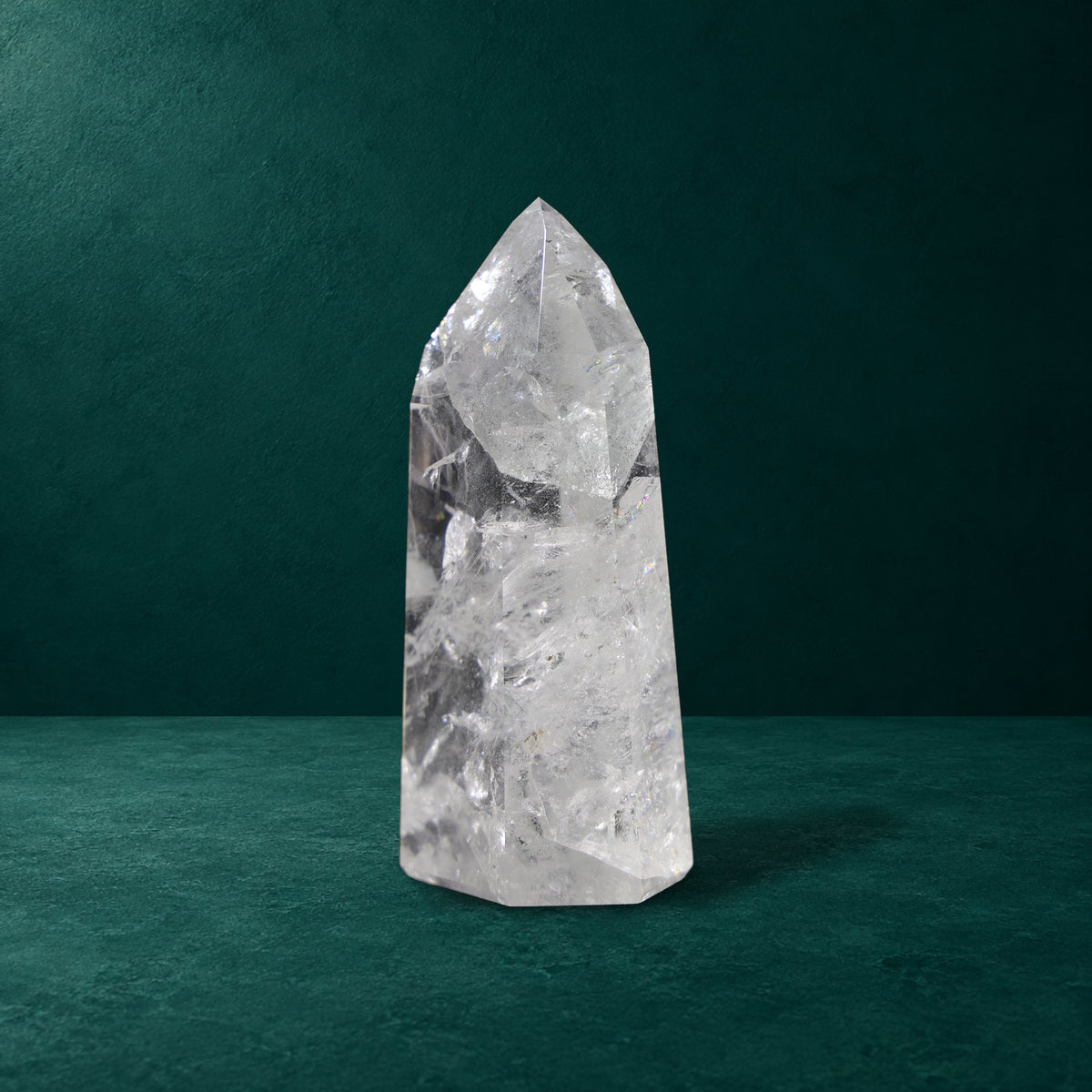 Angled side view of the 0.897 kg polished quartz point.