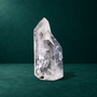 Angled view of the 0.718 kg polished quartz point.