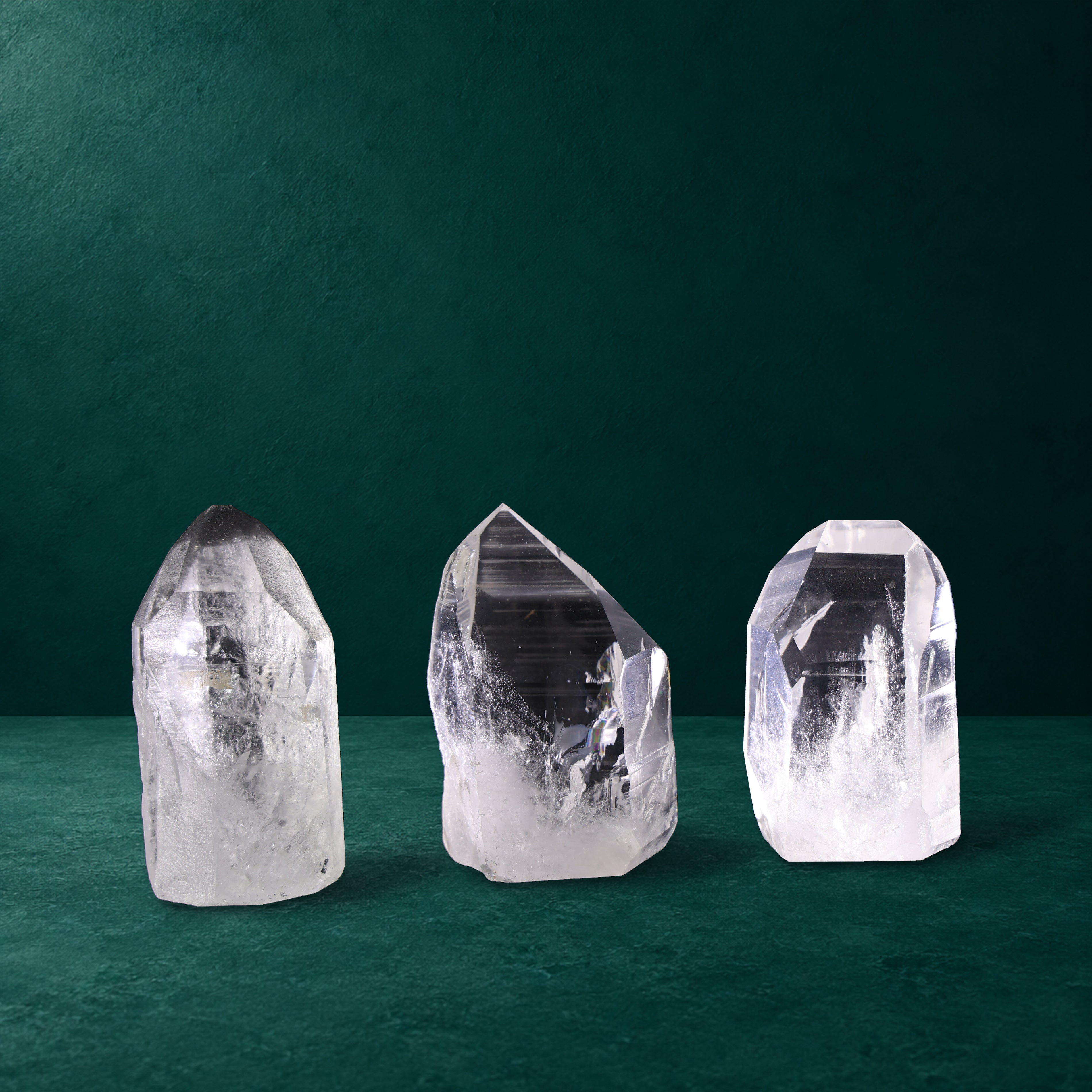 Set of three polished quartz points, 1.302 kg total, group view