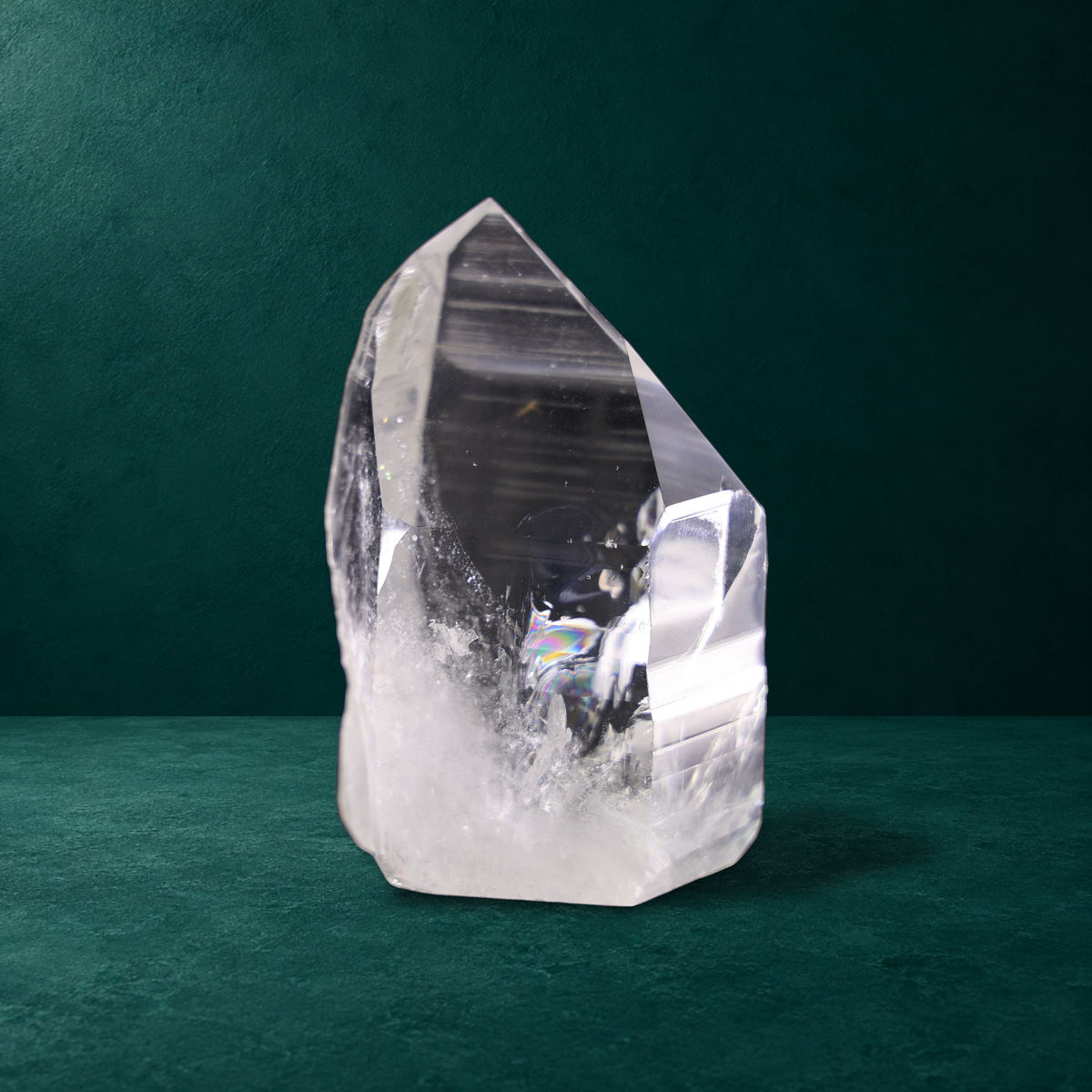 Individual polished quartz point from the three-piece set, front view