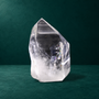 Polished quartz point from the three-piece set, angled view