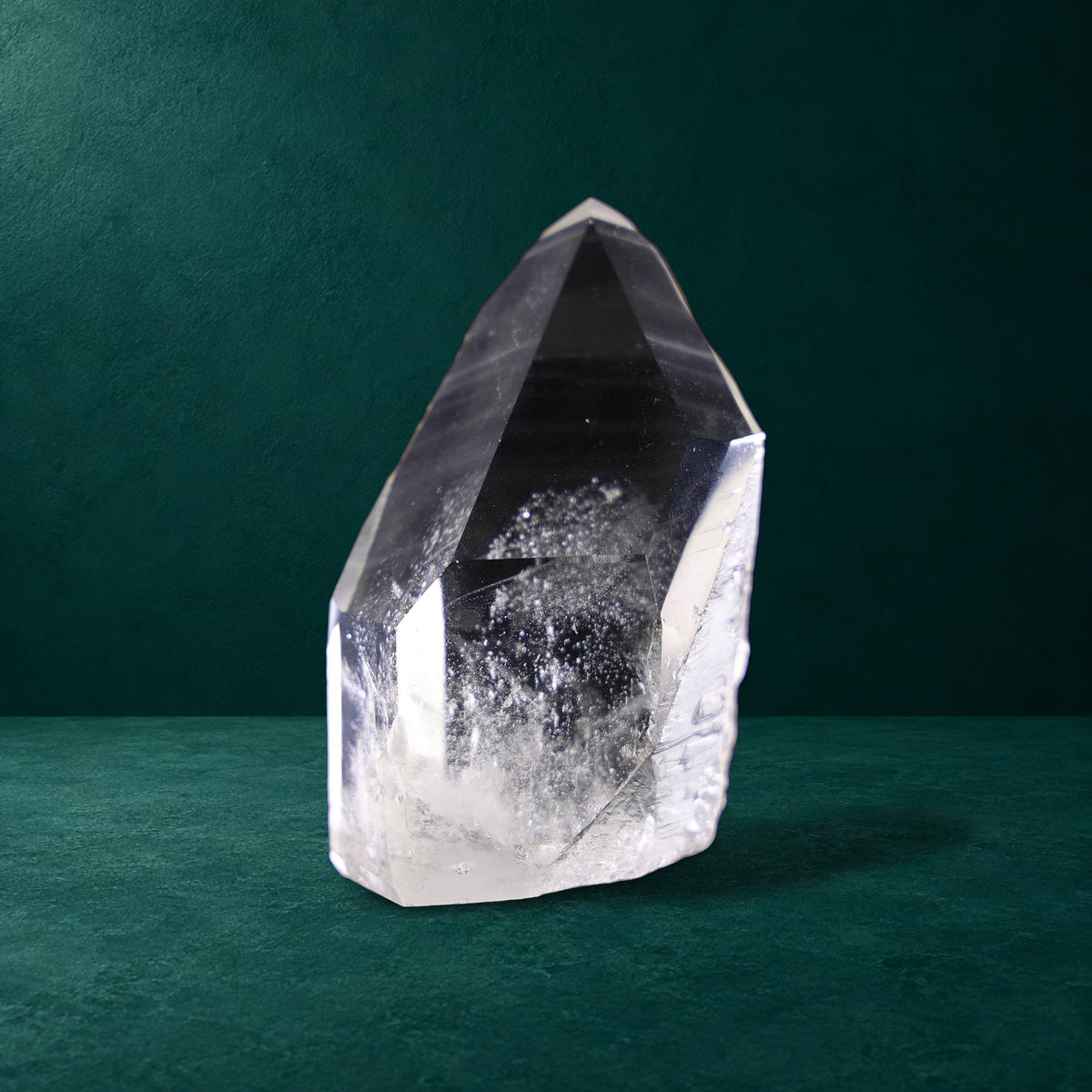 Third polished quartz point in the four-piece set