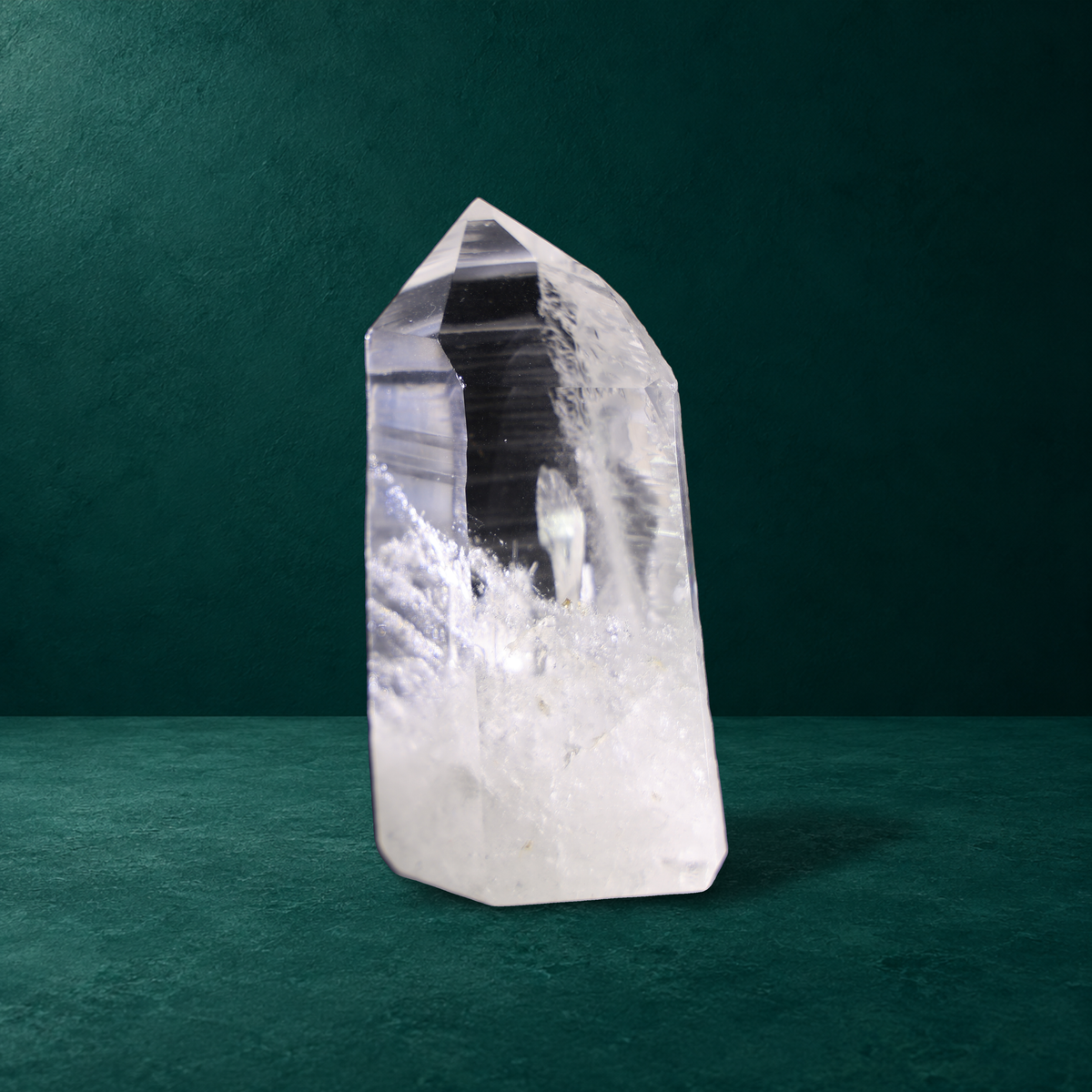 Fourth polished quartz point in the four-piece set