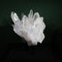 Front view of the large-point Lemurian quartz cluster on its included display base