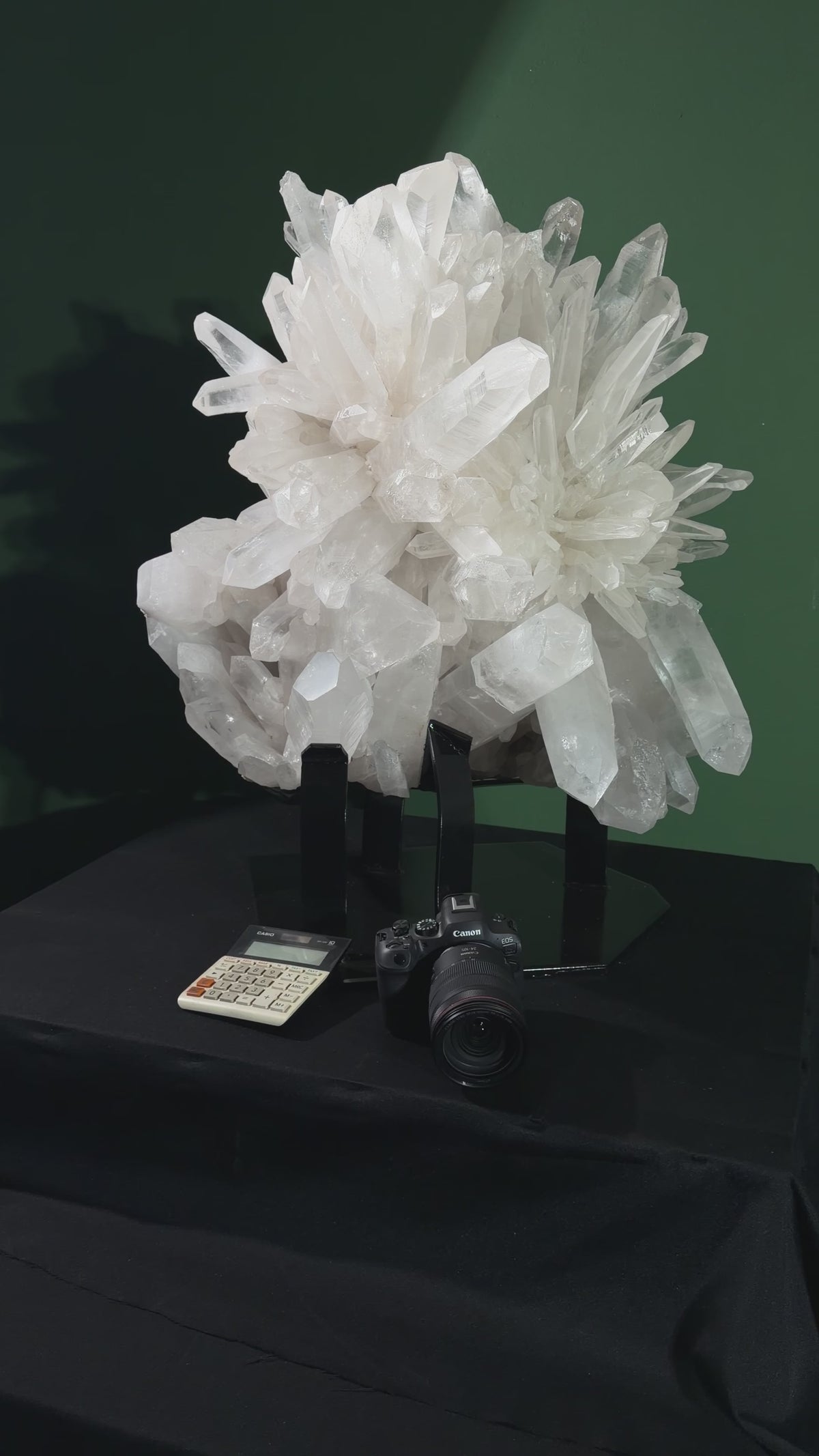 Video view of the flower-shaped Lemurian quartz cluster on its display base